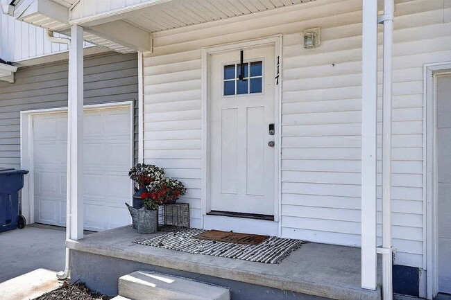 Photo - Like-New 2024 Townhome with Mountain Views, Garage & Backyard