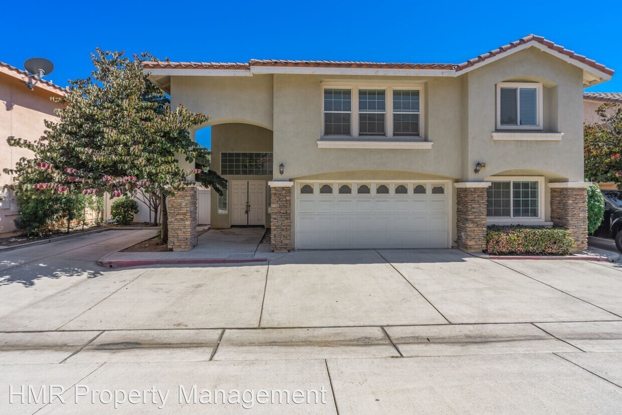 Foto principal - 5 br, 2.5 bath House - 9614 Helena Ave