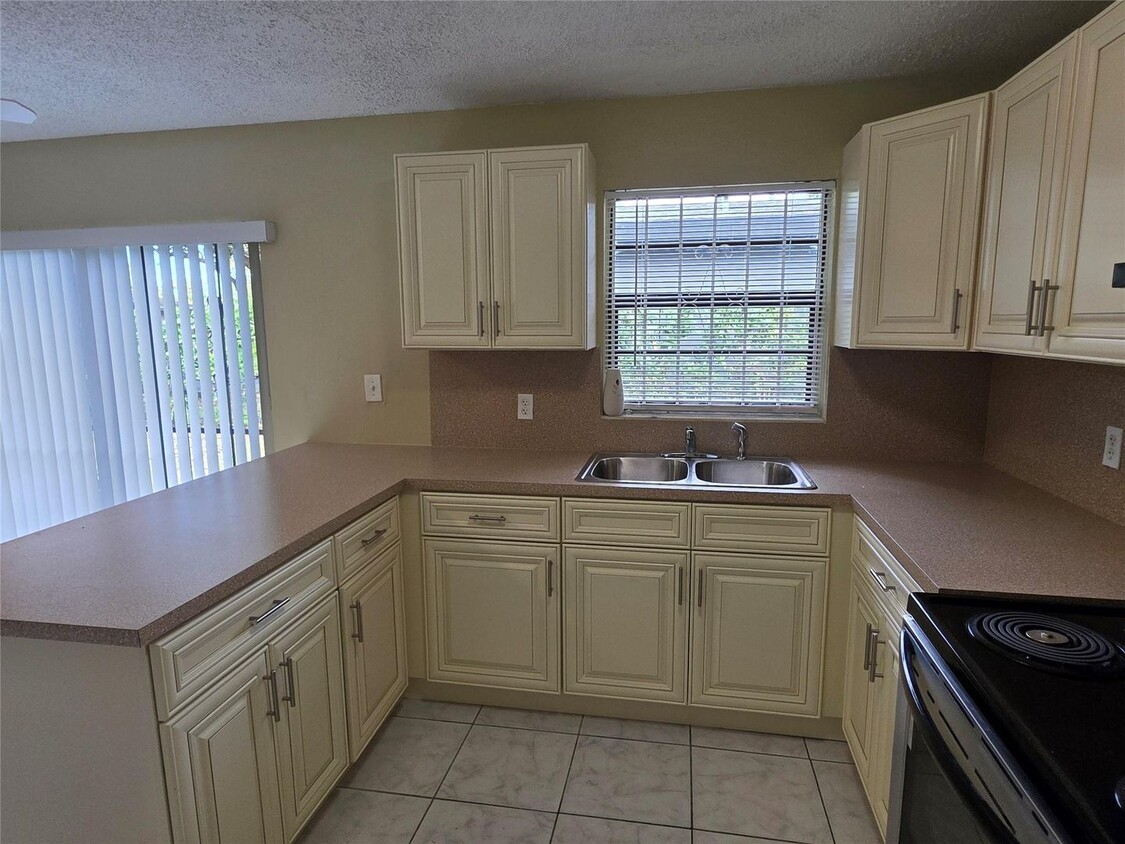 Photo - 309 NE 169th Street, North Miami Beach, FL 33162