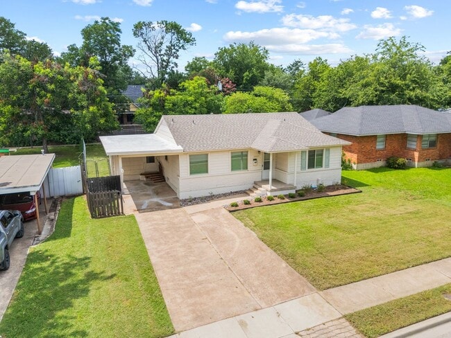 Photo - **$40K+ IN UPGRADES AND A FENCED BACKYARD WITH TWO STORAGE BUILDINGS** House