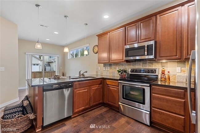 Building Photo - 4 br, 3 bath House - 9324 Stevens Ct NE