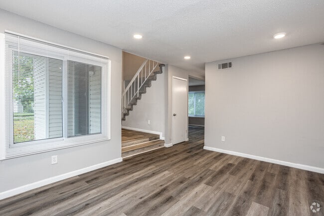 3BR, 1.5BA - 1,142SF - Living Room - Lakeside Reserve