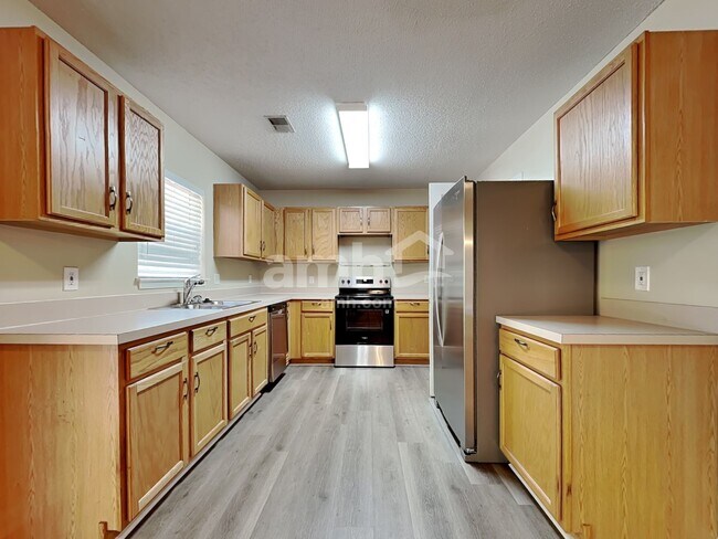 Foto del edificio - 14 Hidden Lakes Ln