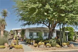 Building Photo - 73418 Palm Greens Pkwy