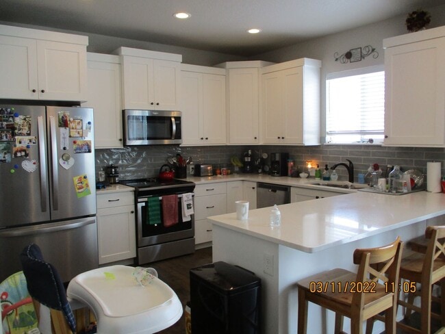 Foto del edificio - Spacious, Pet Friendly 3-Bedroom Townhome ...