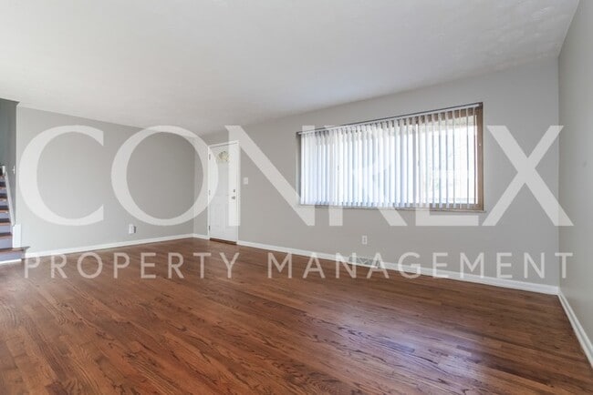 Building Photo - Spacious 3 Bedroom with Cathedral Ceilings!