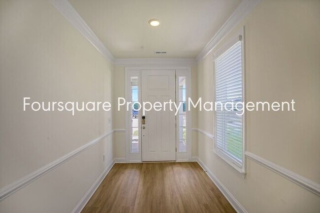 Building Photo - Townhome | Hardwood Flooring | 2 Car Garage