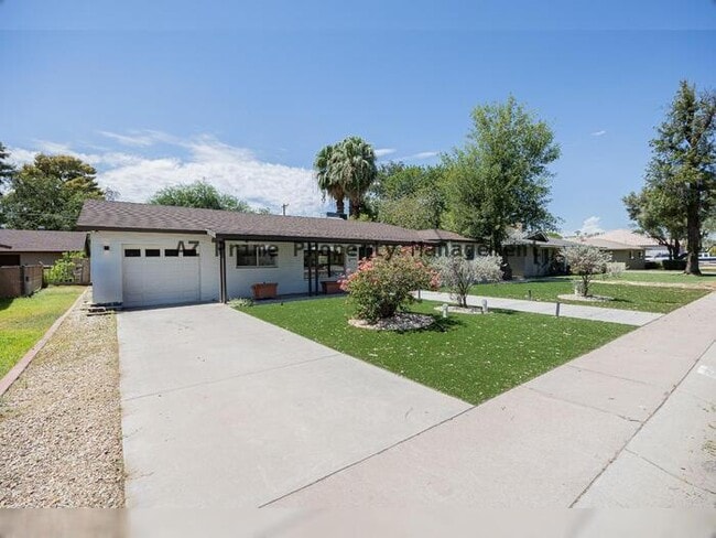 Building Photo - 6828 N 10th Ave
