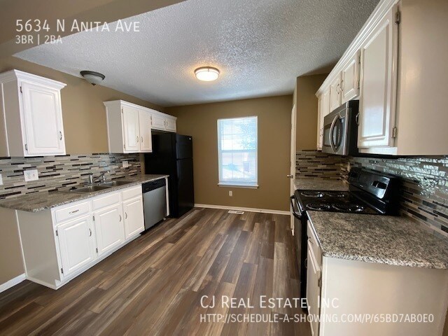 Foto del edificio - 5634 N Anita Ave