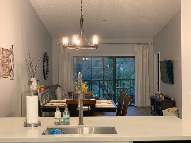Deep sink and breakfast bar. - 1401 Sabal Ridge Cir