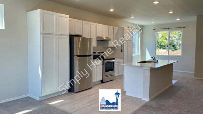 Building Photo - Step Inside to a Townhome Made for Easy Living!