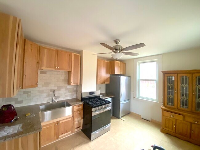 renovated kitchen - new stainless steel appliances - 183 Main St