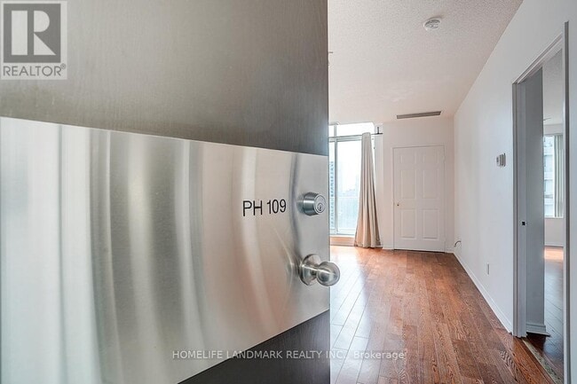 Building Photo - PH109-PH135 EMPRESS Ave
