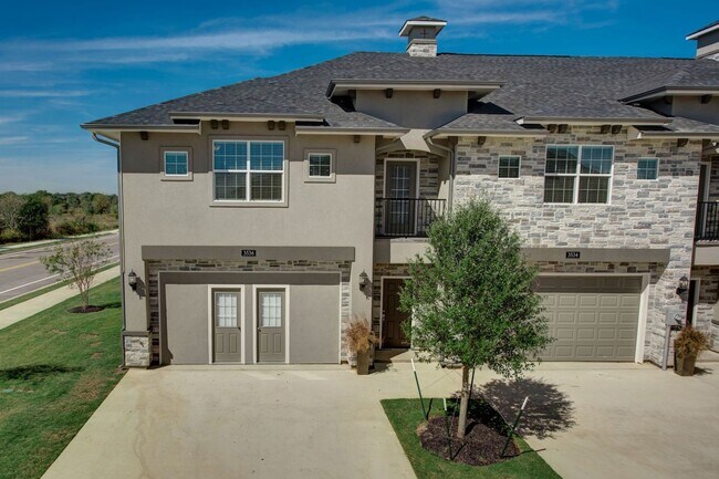 Building Photo - Available August 2026! The Best New Townhome Community in BCS!