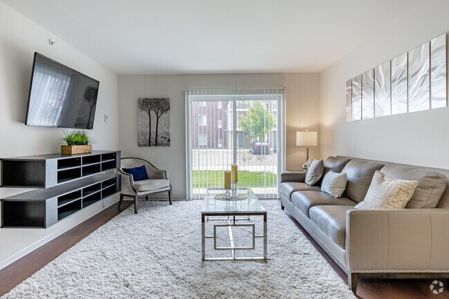 2 habitaciones, 1 baño - 960 pies cuadrados - Sala de estar - Bell Estates Apartments