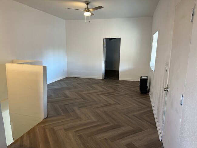 Cozy living room a 5,200 BTU heat source and new light fixtures - 1718 E Abriendo Ave