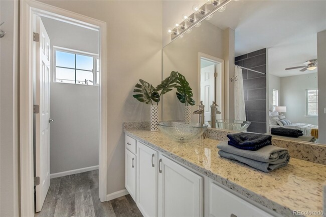 Extended granite vanity - 10784 W 63rd Pl