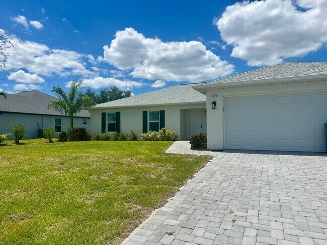 Building Photo - Available Now!! NW CAPE CORAL - 4 Bedrooms - 3 Bathrooms - 2 Car Garage