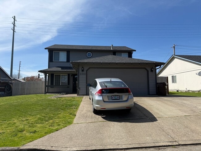 Photo - Spacious 4-bdrm/2.5-bath Hillsboro home. Fenced yard w/ covered deck, 2-car garage, great location