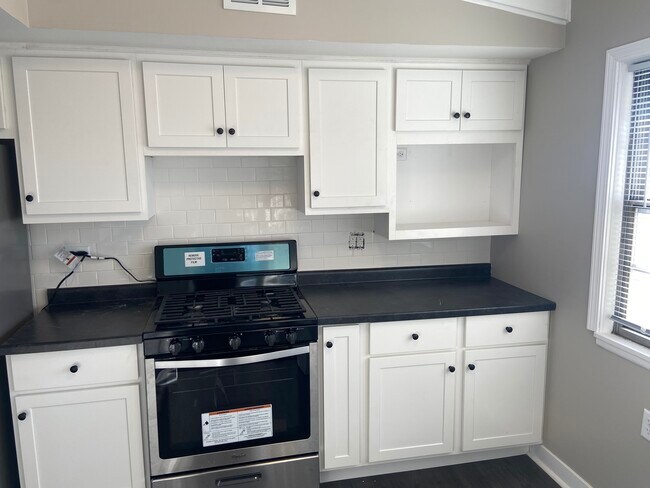 New kitchen cabinets and appliances - 6904 Monroe Ave