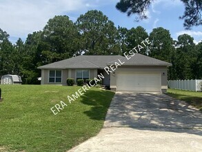 Building Photo - 7468 Woodmont Rd