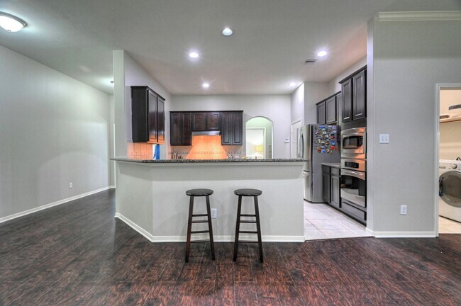 Foto del edificio - 7810 Oak Moss Dr