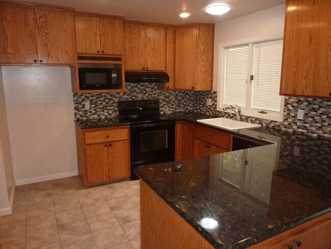 Building Photo - Nicely Remodeled with Granite Countertops,...