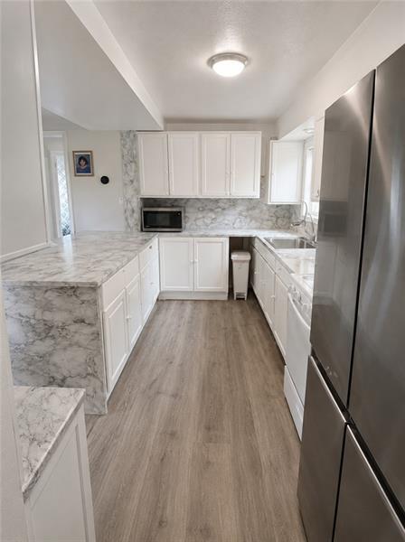 Foto del edificio - 5361 Orchard Hill Dr