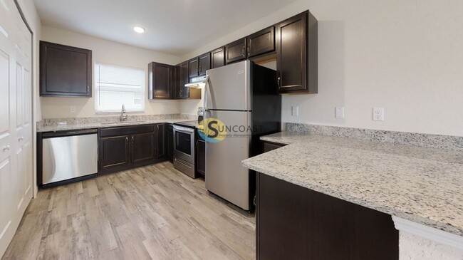 Building Photo - 9021 N Travis Dr