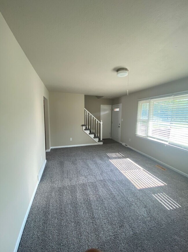 Building Photo - Updated 4 Bedroom with 2 Stall Garage