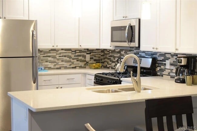 Building Photo - 6626 Erie Rd