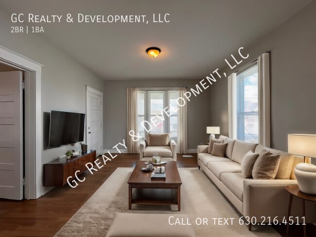 Building Photo - ***ELGIN LOCATION - 1ST FLOOR UNIT / 2 BDR...