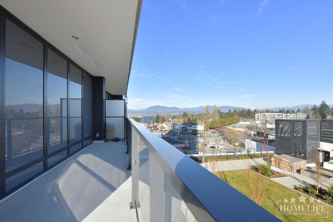 Photo du bâtiment - Stunning 2 Bedroom 2 Bathroom Condo at The Grand with Wraparound Deck Views and Concierge Living