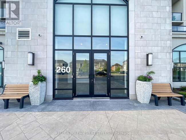 Photo du bâtiment - 260-260 Villagewalk Blvd
