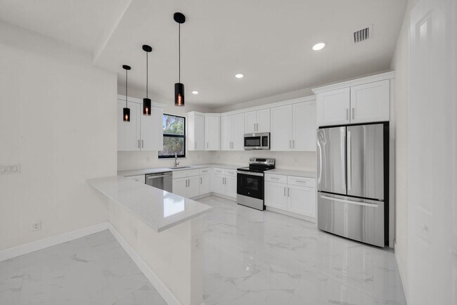 Foto del edificio - Be the first in occupy this 2026 constructed home in the city of Port Charlotte FL! Qualify for a...