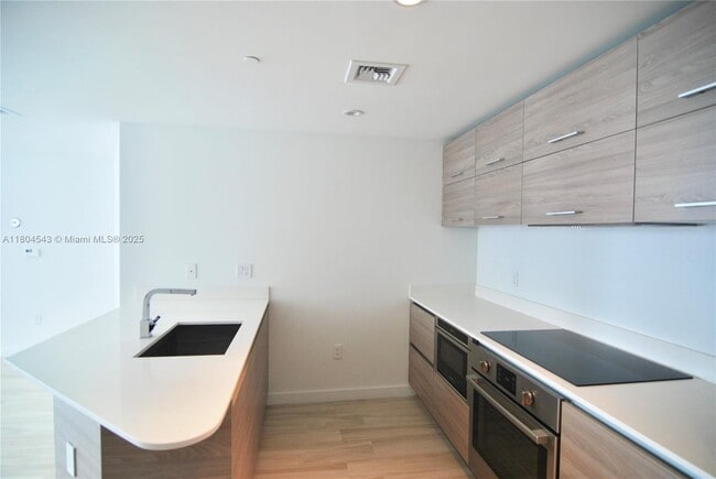 Building Photo - 1300 S Miami Ave