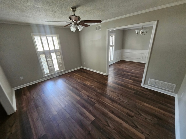 Photo - Spacious 3BR/2BA Memphis Rental with 2-Car Garage, High Ceilings & Screened Porch House