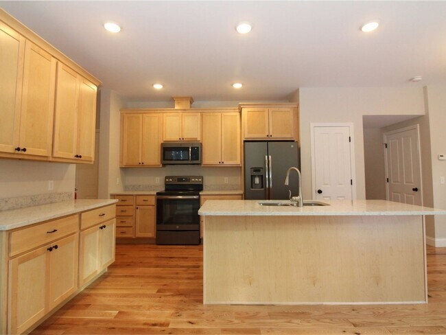 Building Photo - 4BD/3.5BA S. Burlington Townhome - Hillside at O'Brien Farm