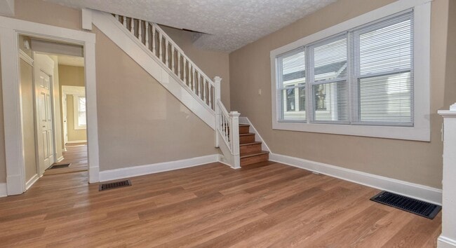 Building Photo - Bates-Hendricks/Newly Remodeled 3 Bedroom Half Double