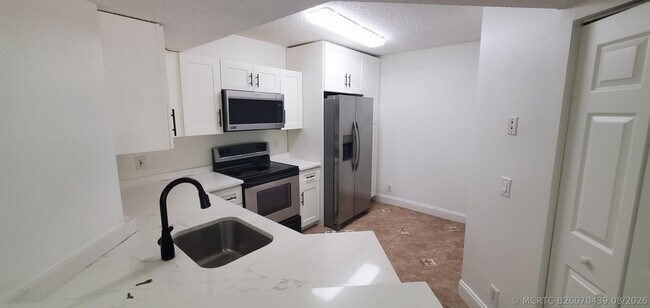 Building Photo - 8721 Wiles Rd