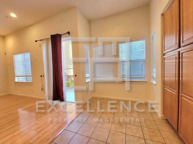 Building Photo - Spacious 3/2.5 Located In Communication Hills, With Two 1 Car Garages, W/D & Large Master Retreat