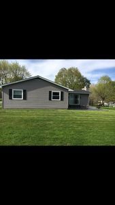 South side of house - 704 Coralyn Dr