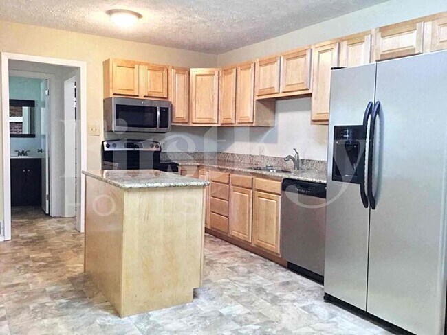 Foto del edificio - 10730 E 56th St