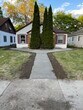 Front shot with new sidewalk/steps. Taken 5/21. - 4525 Minnehaha Ave
