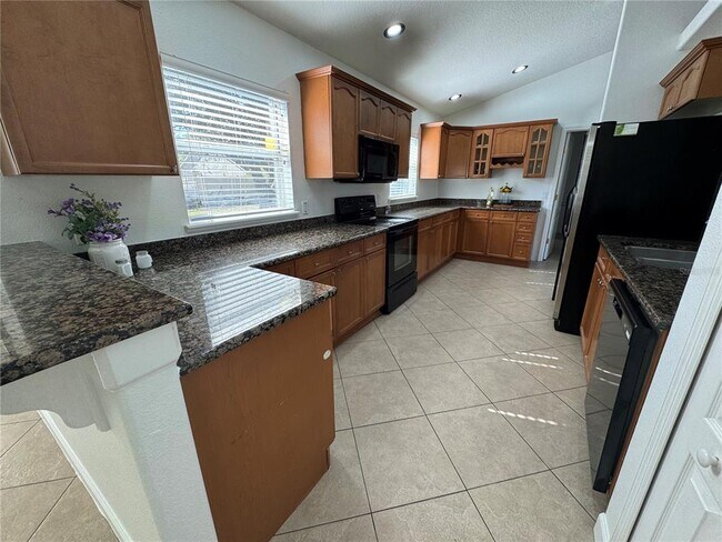 Foto del edificio - 14940 Day Lily Ct