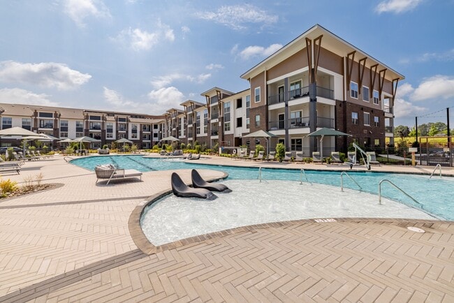 Salt-Water Pool - Resort-style pool with sun shelf, cabanas and grills for relaxing and entertaining close to home. - The Parian Mooresville