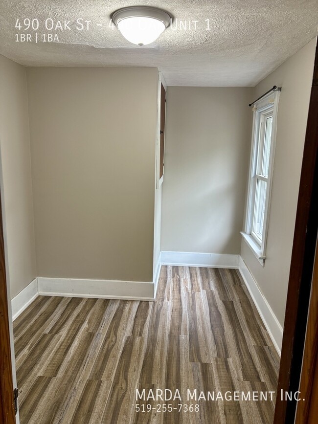 Photo du bâtiment - SPACIOUS 1-BEDROOM PLUS DEN/1-BATH UNIT +H...