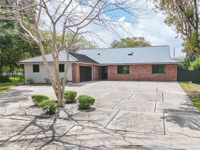 Building Photo - 9620 NW 26th Ct