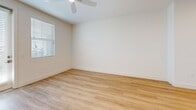 Located at 11821 Skylark Cir in Whittier, CA, this well-designed one-bedroom, one-bathroom residence offers a bright and modern living experience on a single floor. Light-toned luxury vinyl plank flooring flows throughout the main living areas, complementing the clean, neutral palette of the walls and trim.

The open-concept kitchen and living room serve as the heart of the home. The kitchen is outfitted with crisp white cabinetry, sleek hardware, a subway tile backsplash, light quartz countertops, and a full suite of stainless steel appliances including a gas range, built-in microwave, dishwasher, and a French door refrigerator. Recessed lighting illuminates the space efficiently.

The bedroom is a comfortable, well-proportioned retreat featuring plush carpet flooring, a ceiling fan, and large windows that invite generous natural light and pleasant neighborhood views. A dedicated walk-in closet with dual hanging rods and built-in shelving provides ample storage.

The bathroom maintains the home's clean aesthetic with white cabinetry, modern hardware, and continuous wood-look flooring. A hallway connects the primary spaces, contributing to an efficient and practical layout. Ceiling fans are present in the bedroom areas, enhancing year-round comfort throughout this thoughtfully finished residence.