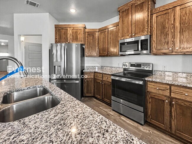 Foto del edificio - Limited Time Special Offer / 4 Bed, 3 Bath Home with Garage / Pet-Friendly / Vouchers Accepted / ...